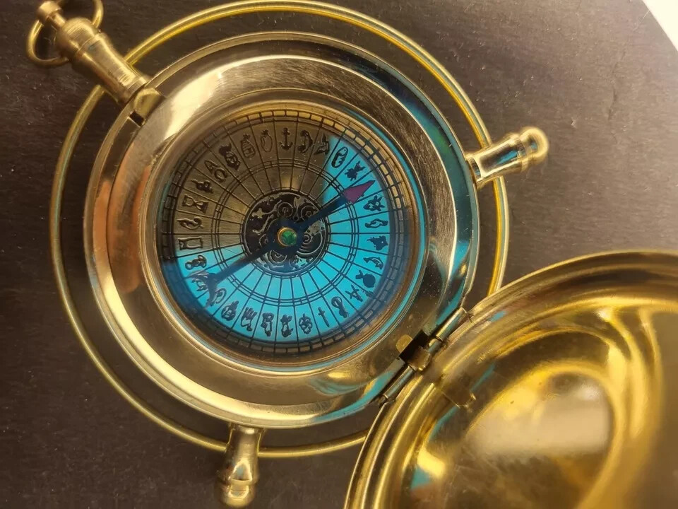 Golden Compass Alethiometer Symbol reader Truth measure