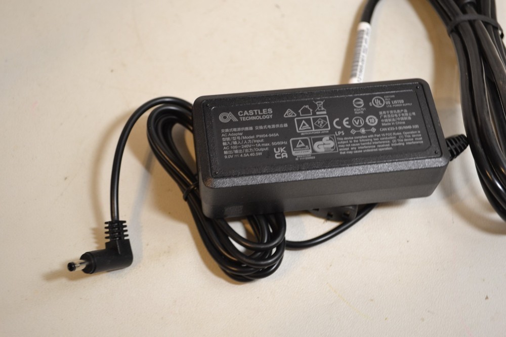 Castles Technology AC Adapter Model: PW04-945A