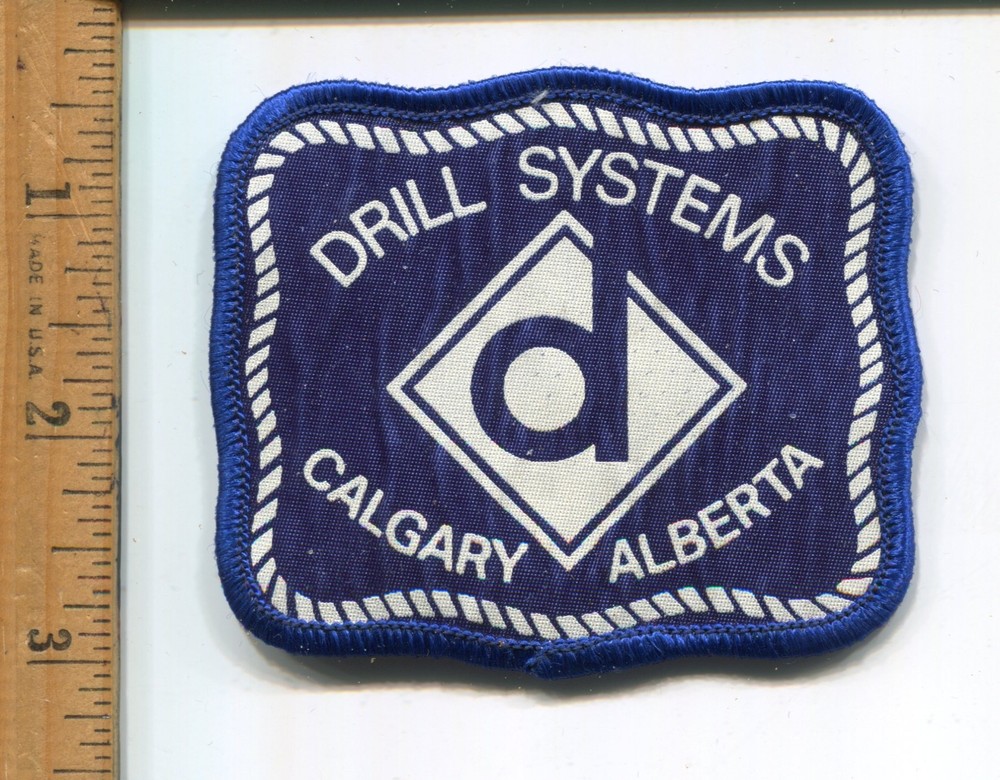 DRILL SYSTEMS HAT/JACKET PATCH  CALGARY ALBERTA VTG.WESTERN ADVERTISING