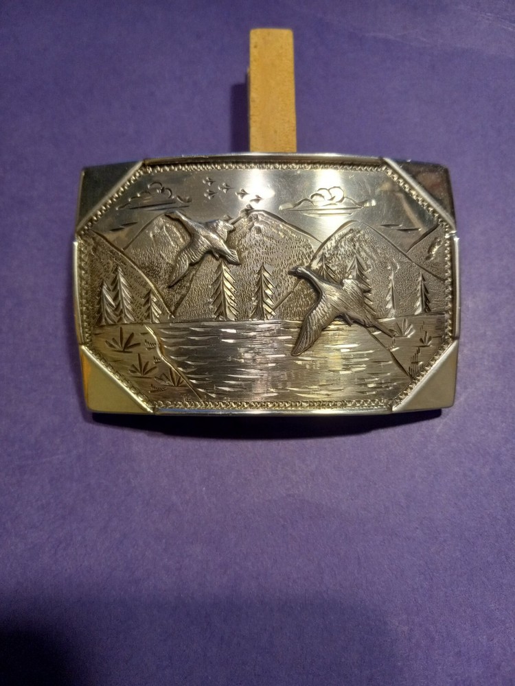 comstock silver belt buckle