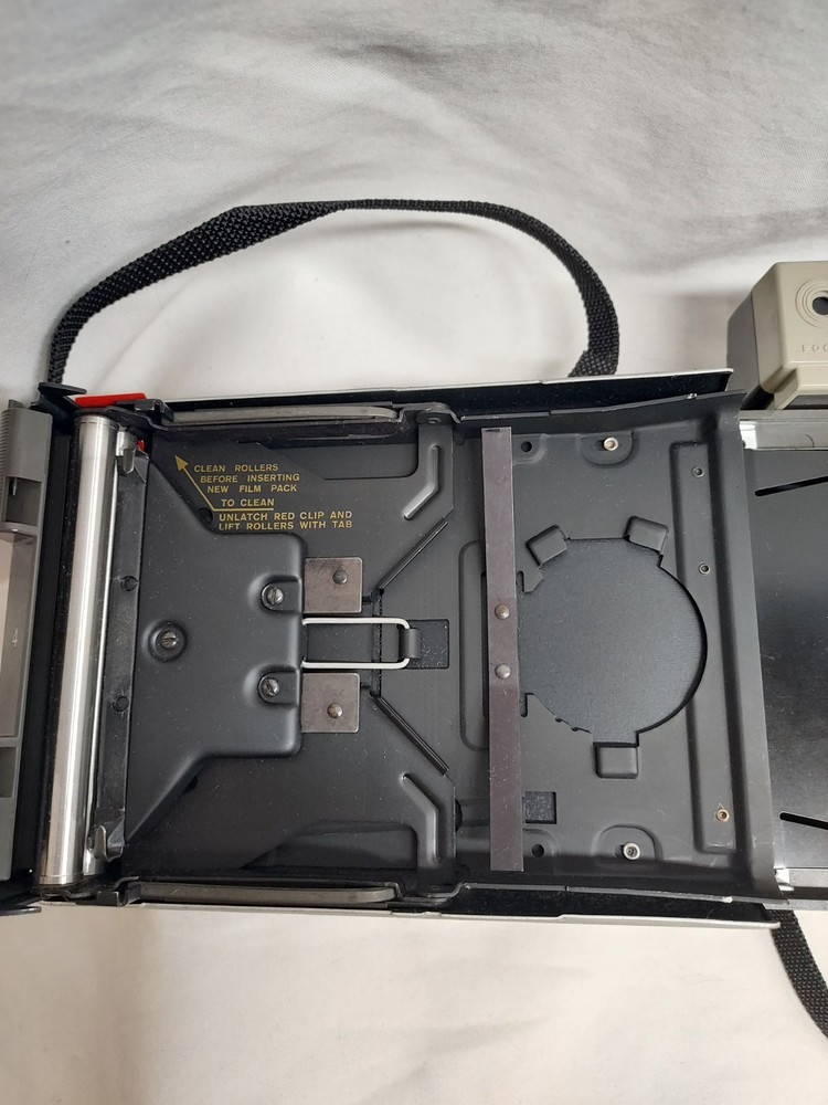 Polaroid 320 Land Camera with Strap, Cold-Clip, User Manual - Untested
