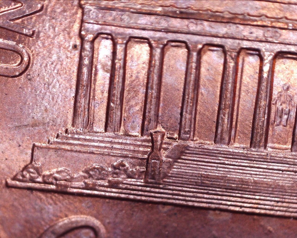 1996 P memorial cent with PLATING BLISTER inside the 3rd bay at the bottom