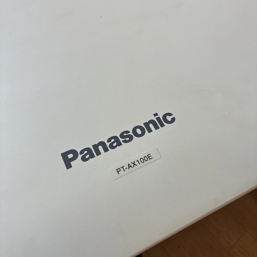 Panasonic LCD Projector PT-AX100E Instructions and remote (Spares & Repairs)