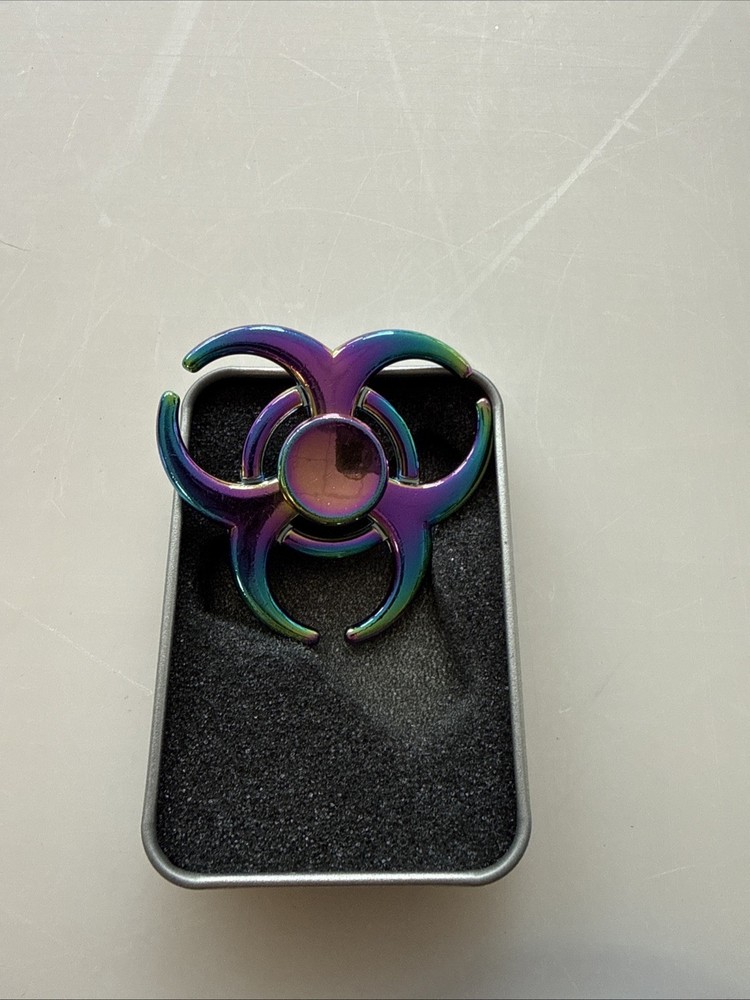 Solid metal construction with metal carrying & display case. Multicolor finish