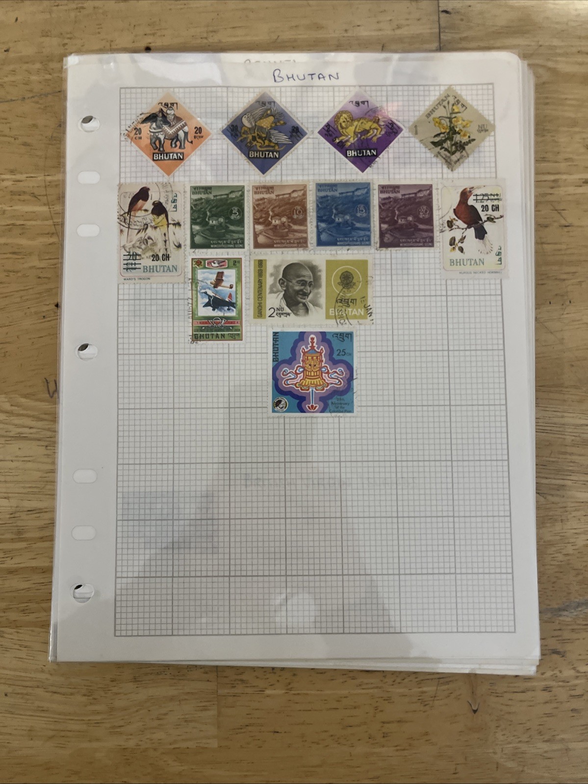 Lot of new and used stamps from all over the world. ON Paper.