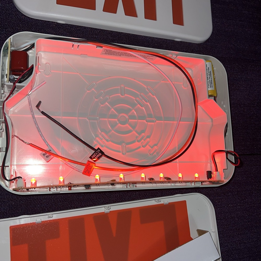 New Exit Sign .Face Plate and mounting bracket Battery pack tested image.
