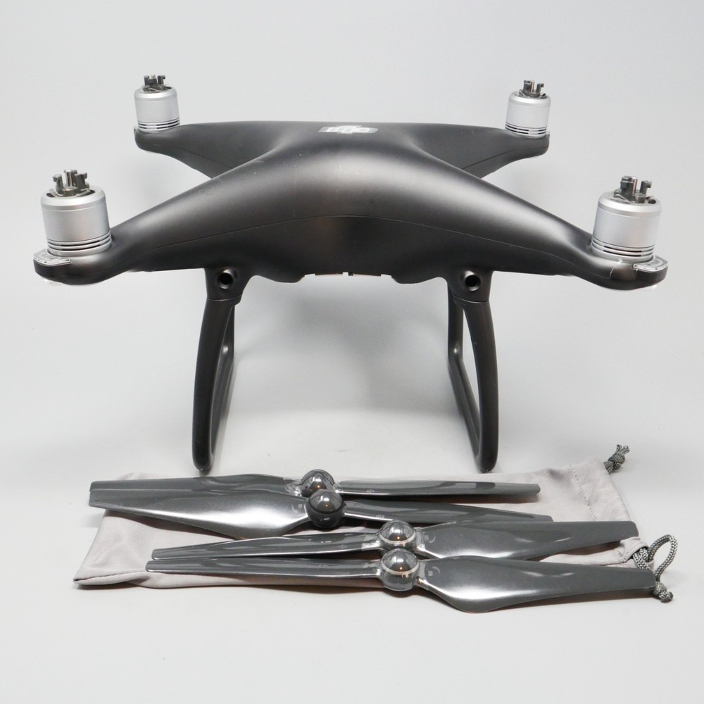 DJI Phantom 4 Quadcopter Drone Only no controller camera battery --- plus Props