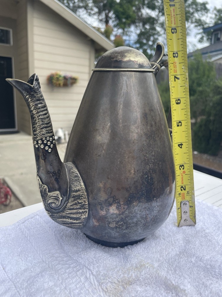 vintage or antique silver-plated teapot or coffee pot