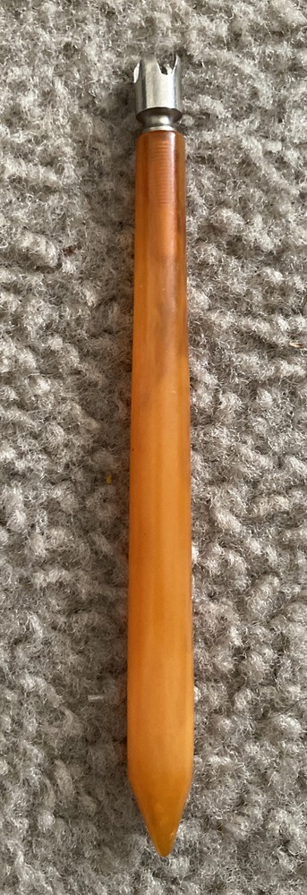 Vtg Butterscotch Bakelite handled tool?