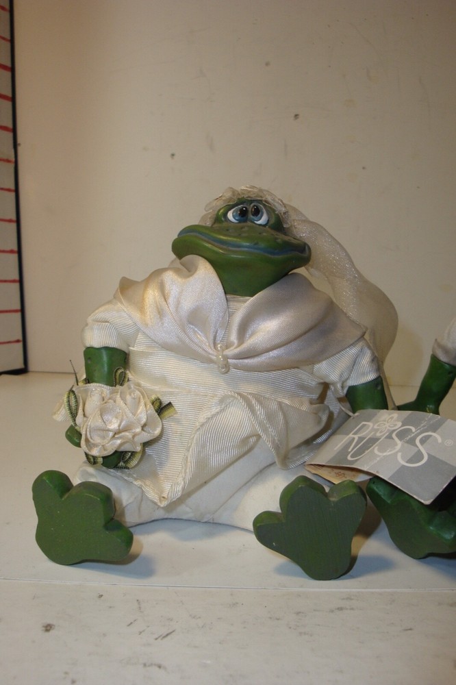 Mr. And Mrs.Pondhopper figures with tags