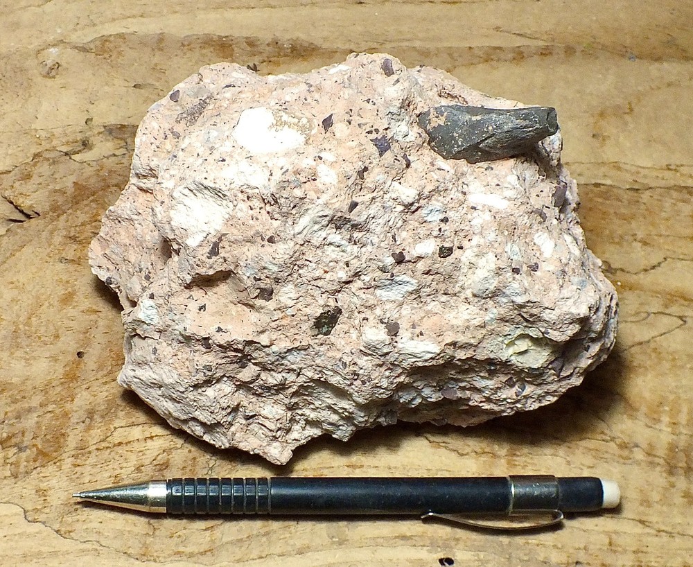 tuff breccia - welded pink volcanic ash with angular clasts - display specimen