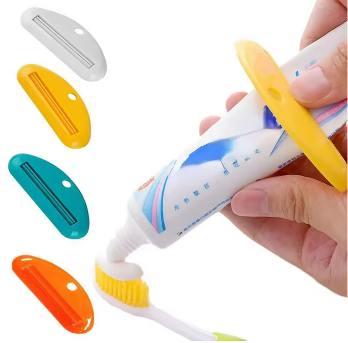 4X Plastic Tube Squeezer Toothpaste Dispenser Holder Rolling Bathroom Extract