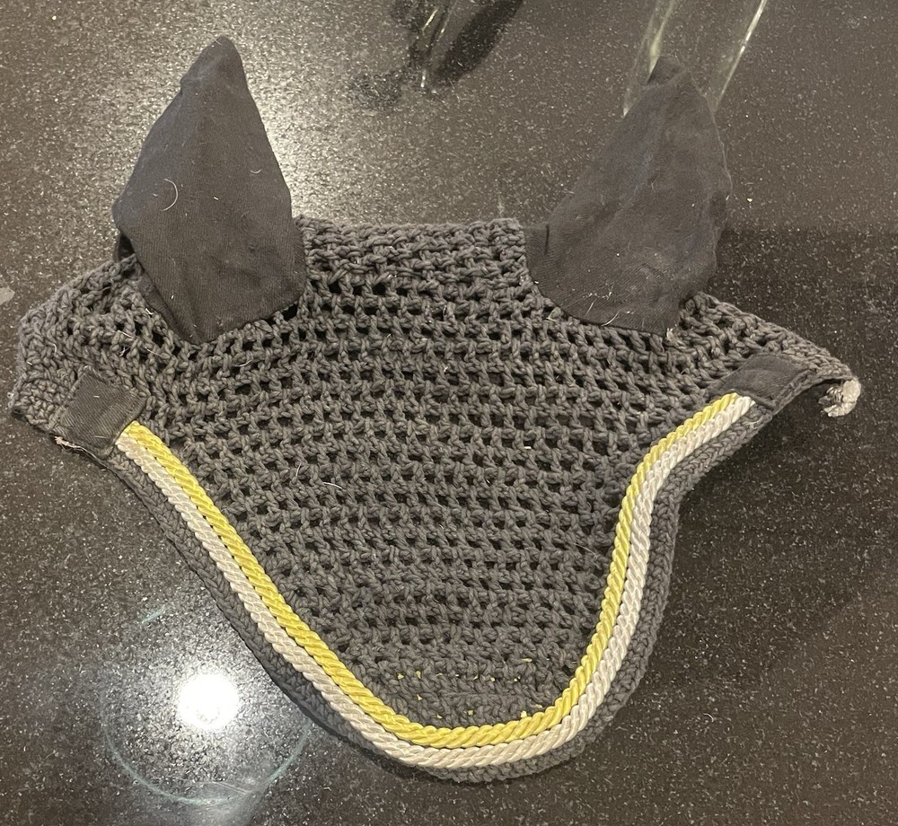 two black ear bonnets for horses