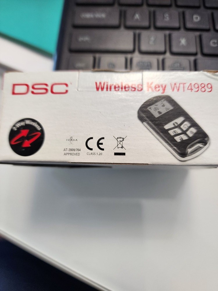 DSC WT4989 4 Button Wireless Backlit Security Key Fob With Icon Display