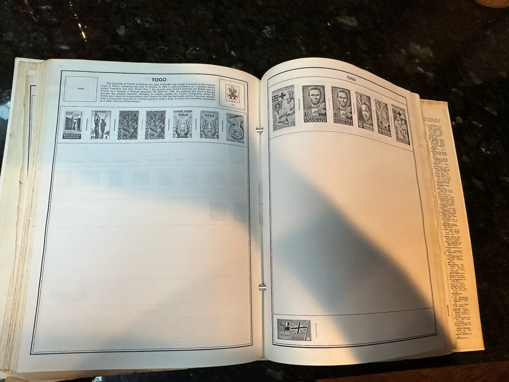 VTG 1977 Traveler Stamp Album With Many Stamps.