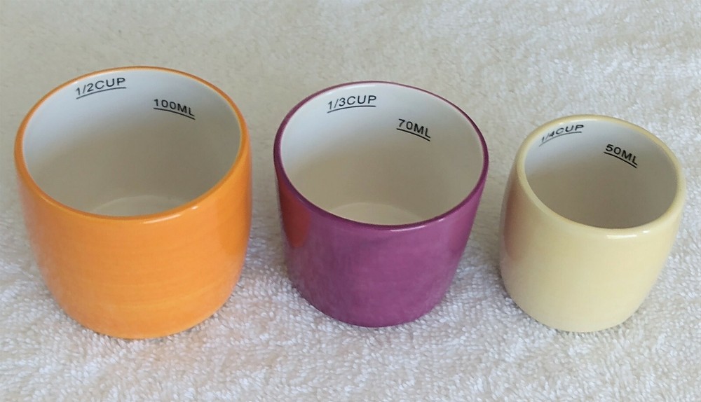 Avon Ceramic Nesting Measuring Cups Orange Purple Yellow Set