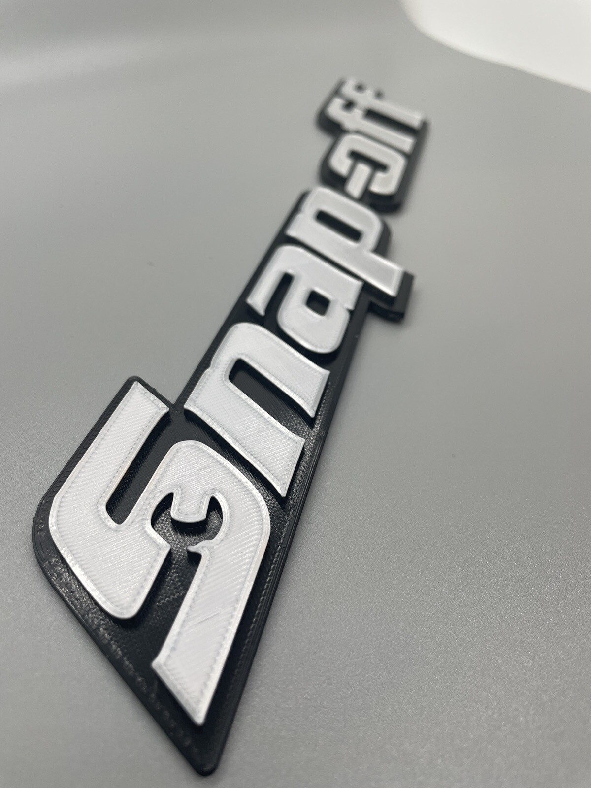 Snap-off Novelty 3D Printed Tool Box Badge.