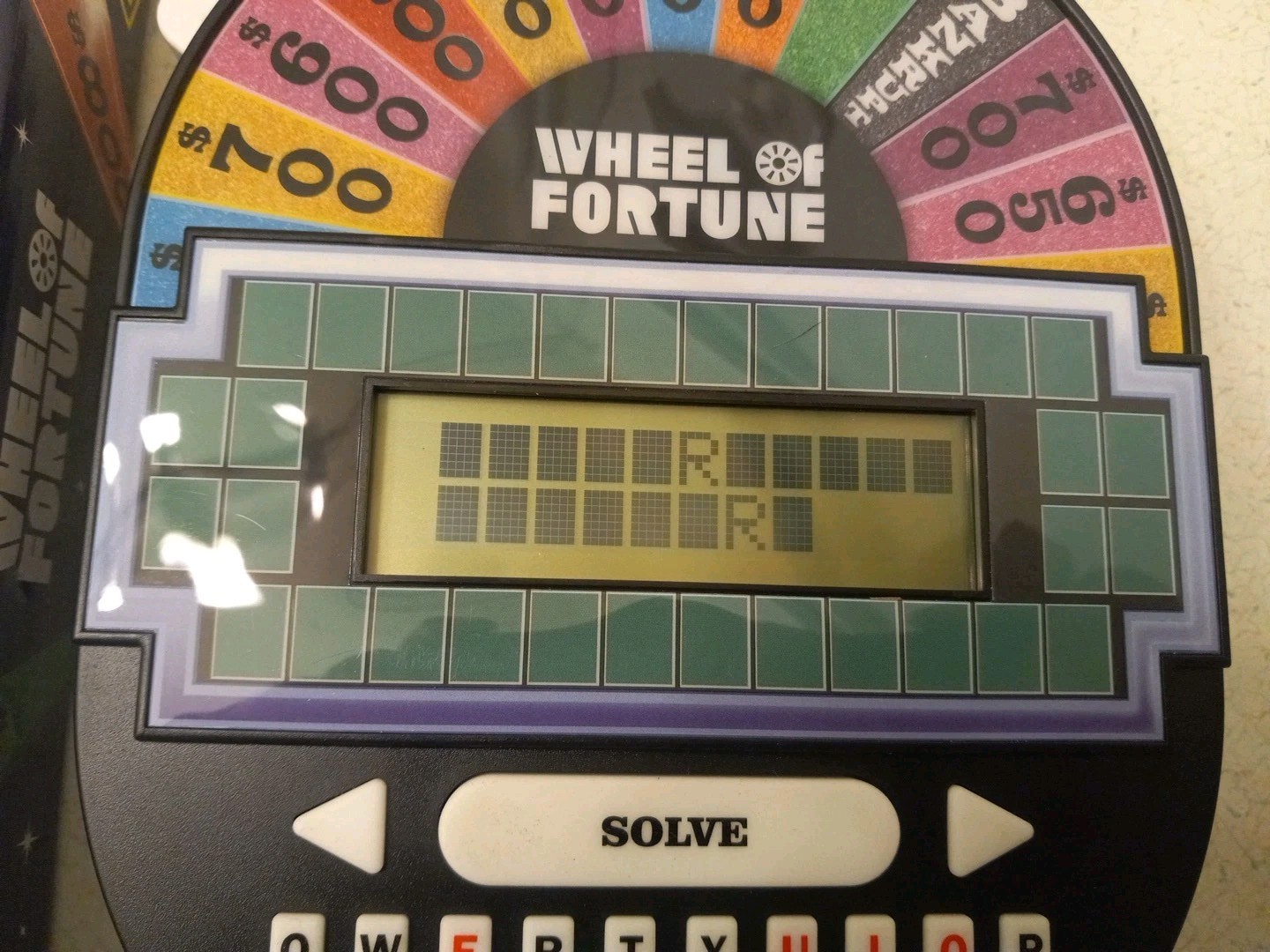 Wheel of Fortune Handheld Electronic Game Great for Travel Classic