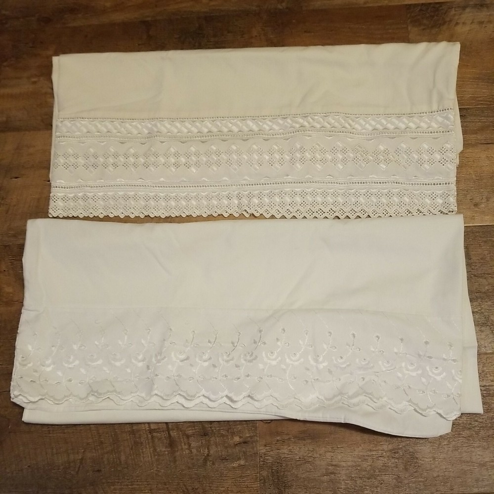 2 White Pillowcases ( Do Not Match)
