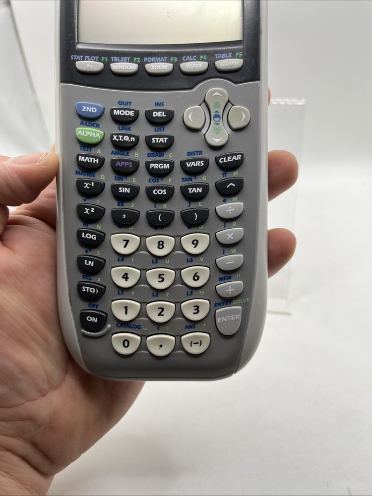 Texas Instruments TI-84 Plus Graphing Calculator - Silver Edition Works