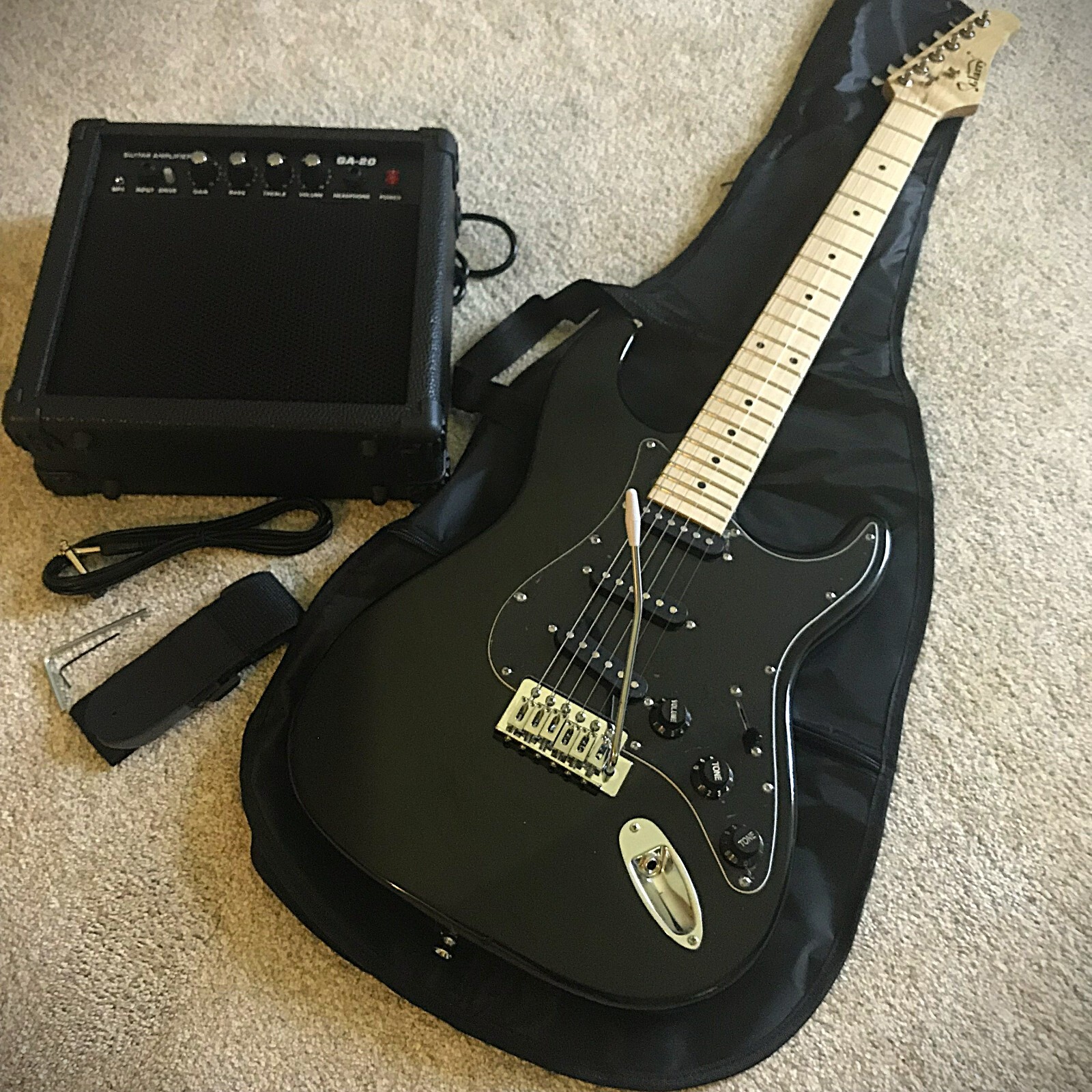 Full-Size Black Electric Guitar Starter Package with 20-Watt Amp and Accessories