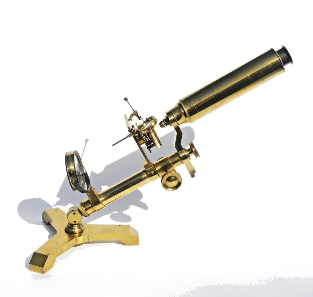 Brass microscope in case.
