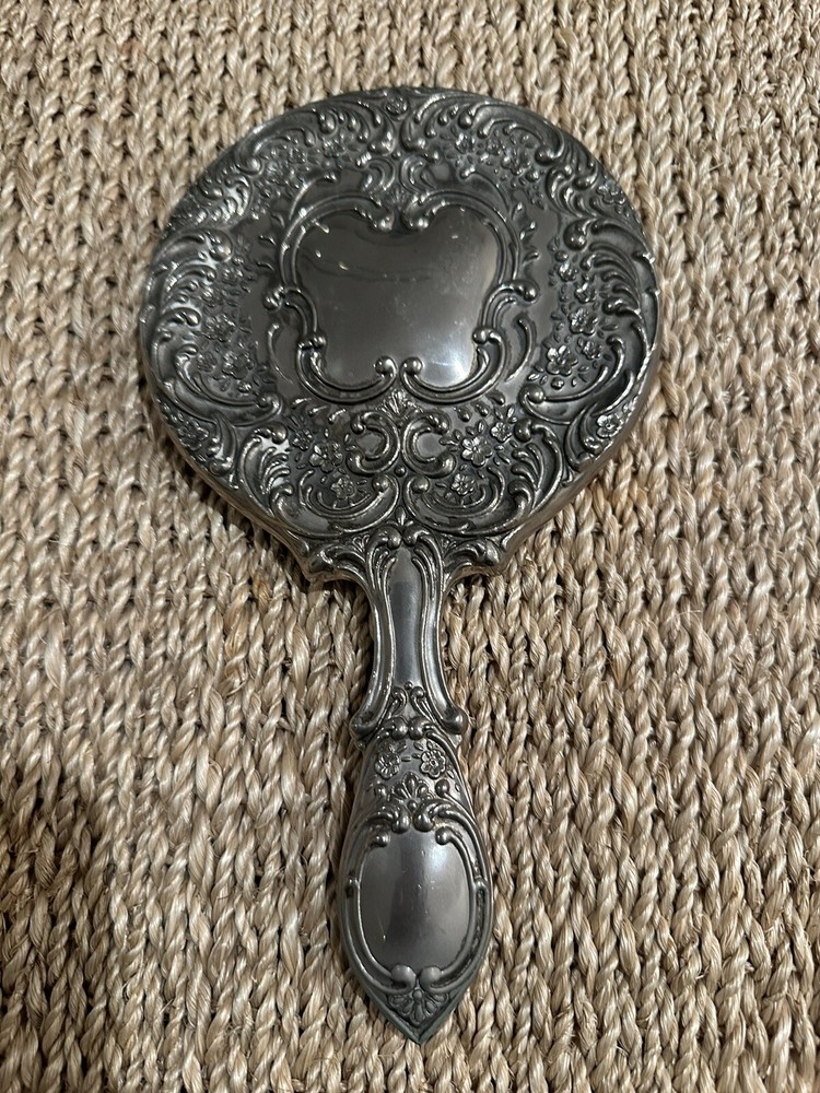 Vintage  Vanity Hand Held Mirror Heavy