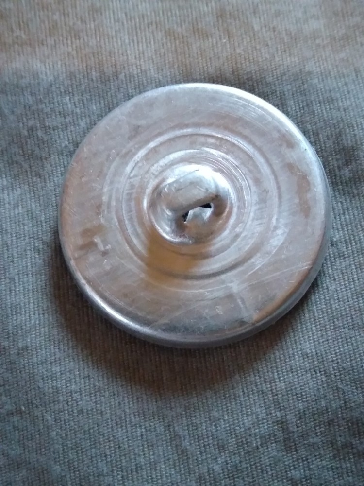 4 Vintage Junque Deco Plastic On Metal Buttons.