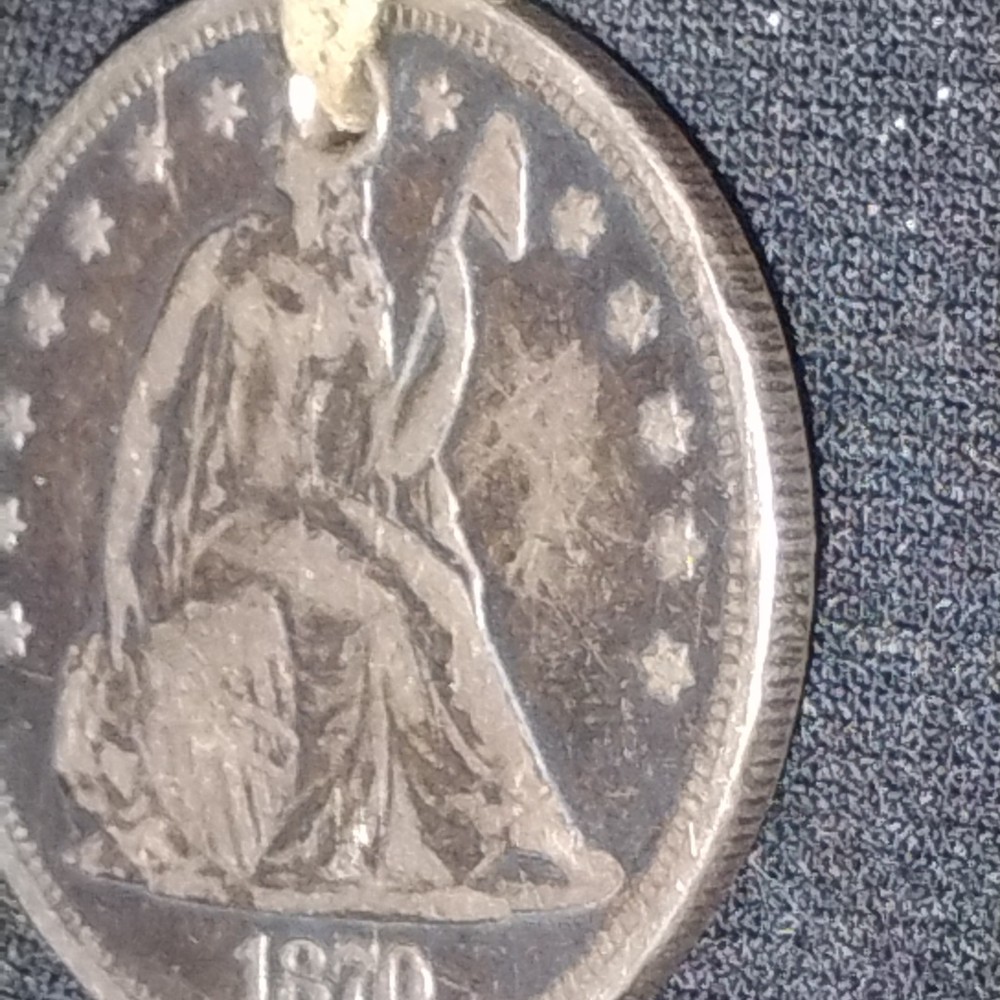 1870 Seated Liberty Dollar
