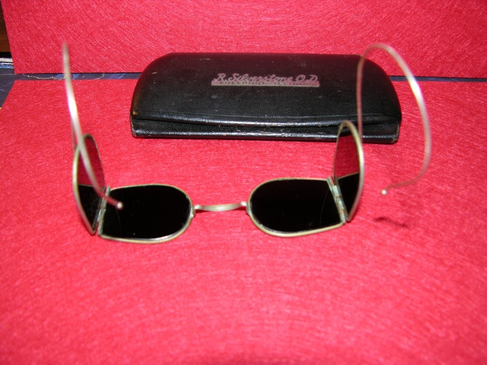 Antique welding glasses with case