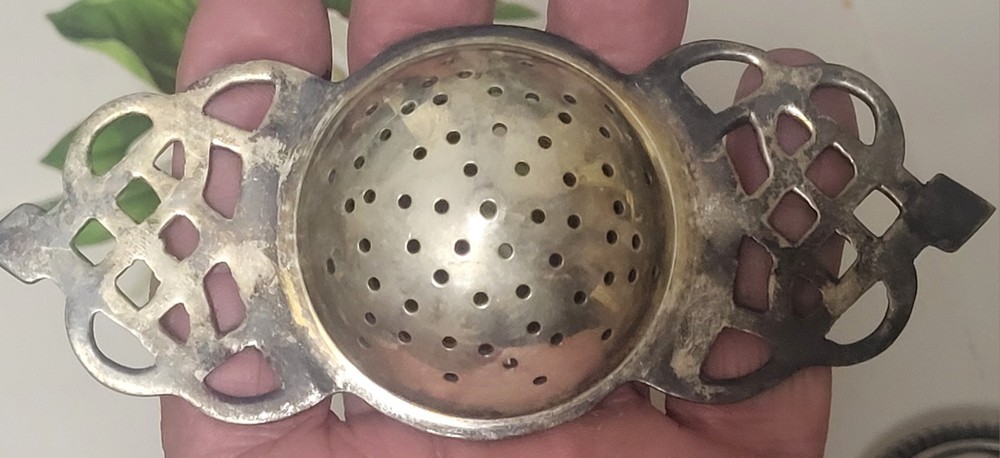 Double Handle Tea Bag Strainer With Drip Pot. Very Nice