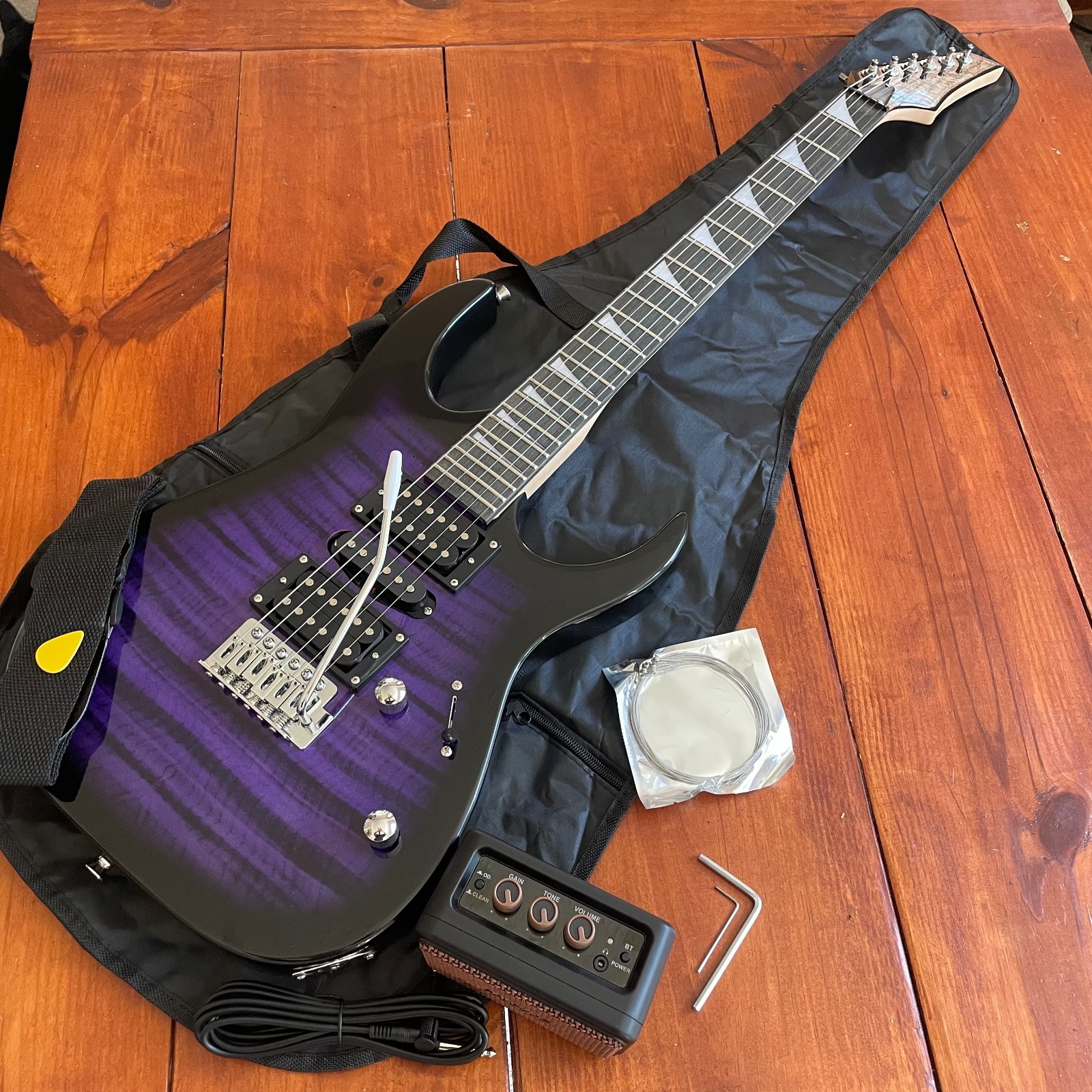 Full-Size Purple Electric Guitar and 5-Watt Amp Starter Package with Accessories