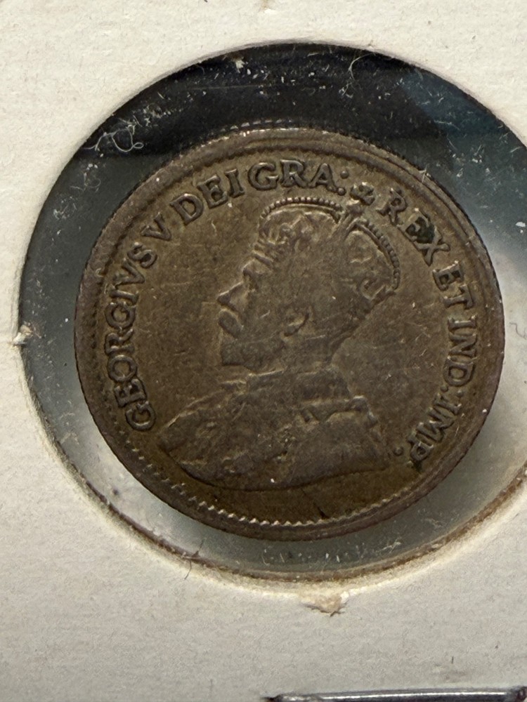 1920 Canadian five-cent coin.