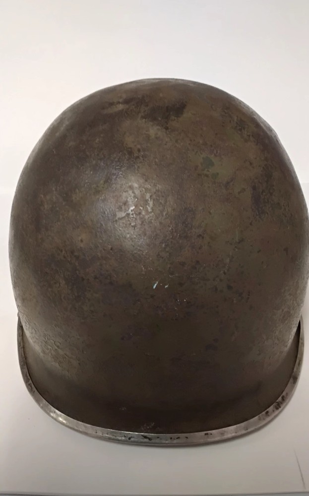 The object in the image is a U.S. M1 combat helmet shell