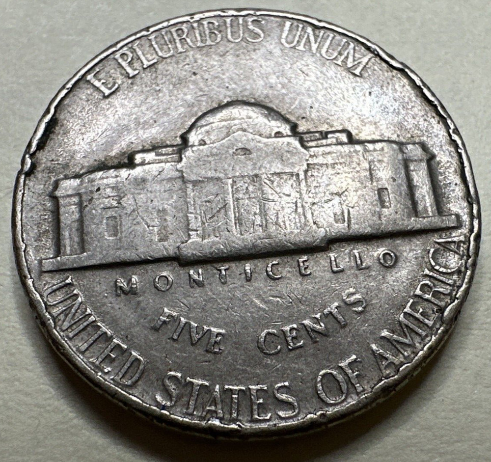 1957 JEFFERSON NICKEL 5C 8852N