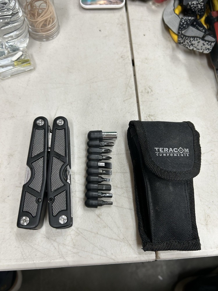 Teracom Components Multi Tool. Knives,saw,leather punch,screwdrivers.