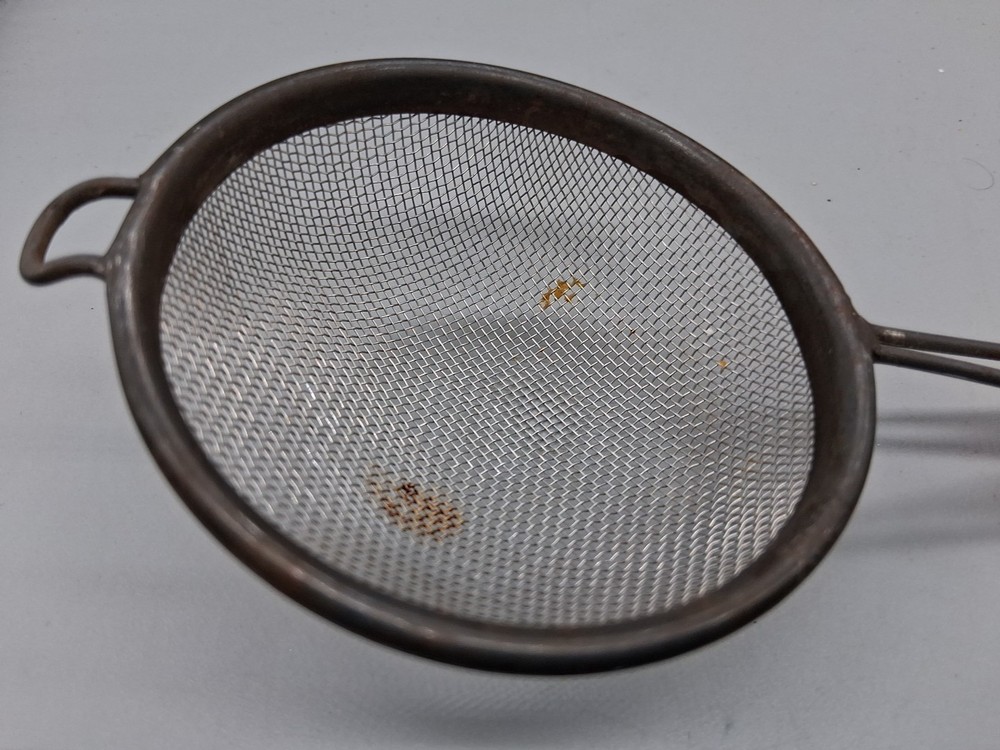 MCM Orange Vintage Bakelite Strainer