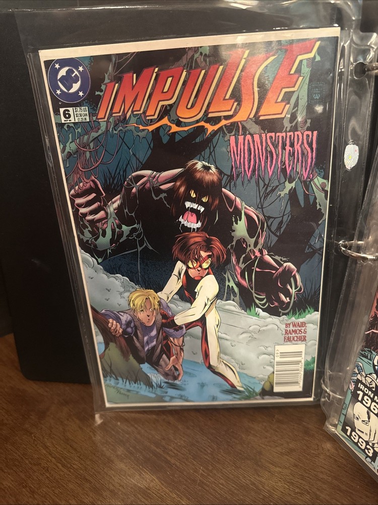 Comic Book Storage Binder With 11 Comics