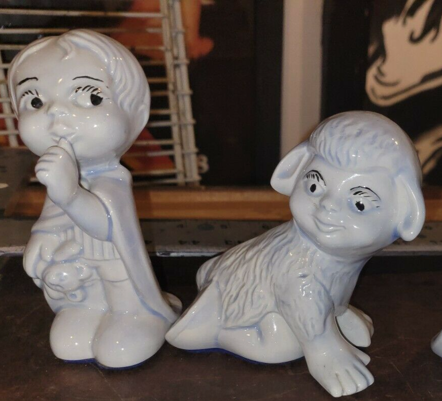 creepy children figurines weird kitsch