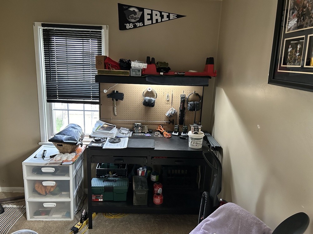 Work Bench With Pegboard Back And Overhead Light.