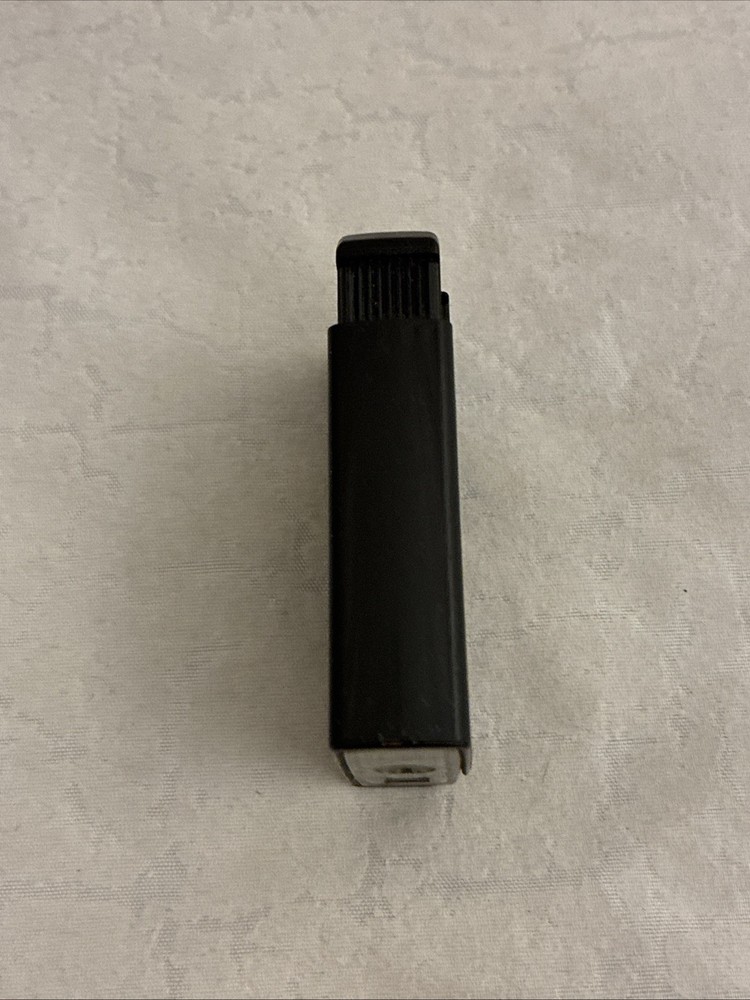 Vintage KISS Tite Rite Lite Lighter Refillable 2004 Catalog