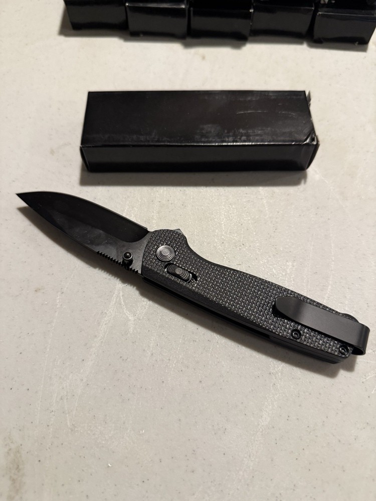Black Folding Pocketknife Drop Point Blade Textured Handle Manual Opening