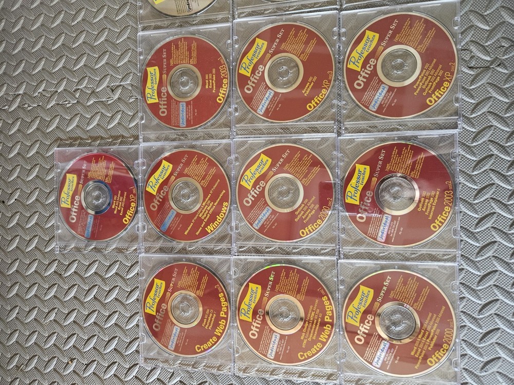 Professor Teaches Office 2000- 2002-2003 set. 16 cds