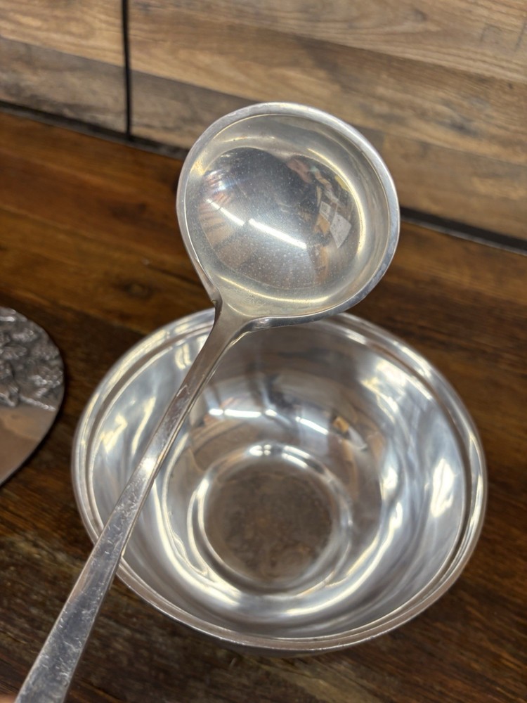 Handcrafted serving dish with lid embedded fruit and leaf designs, aluminum