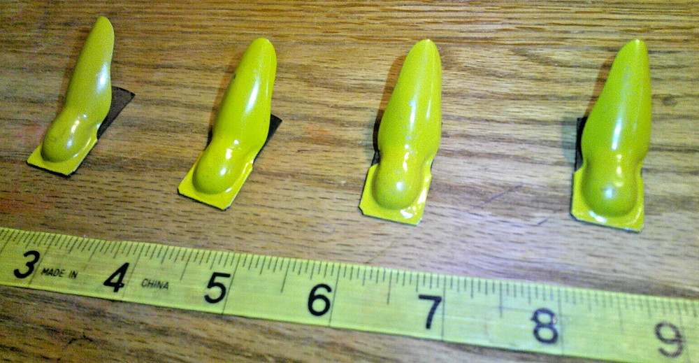 4 original Vintage Tin Litho Clickers