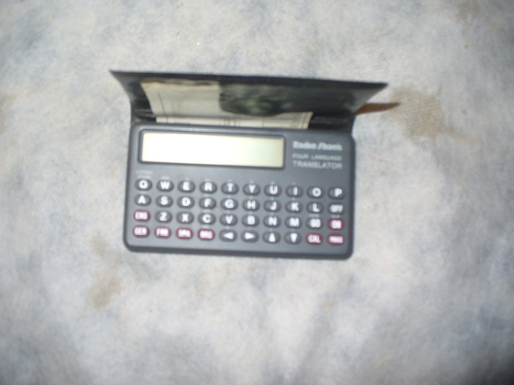 Radio Shack Four Language Translator with Instructions 63-666