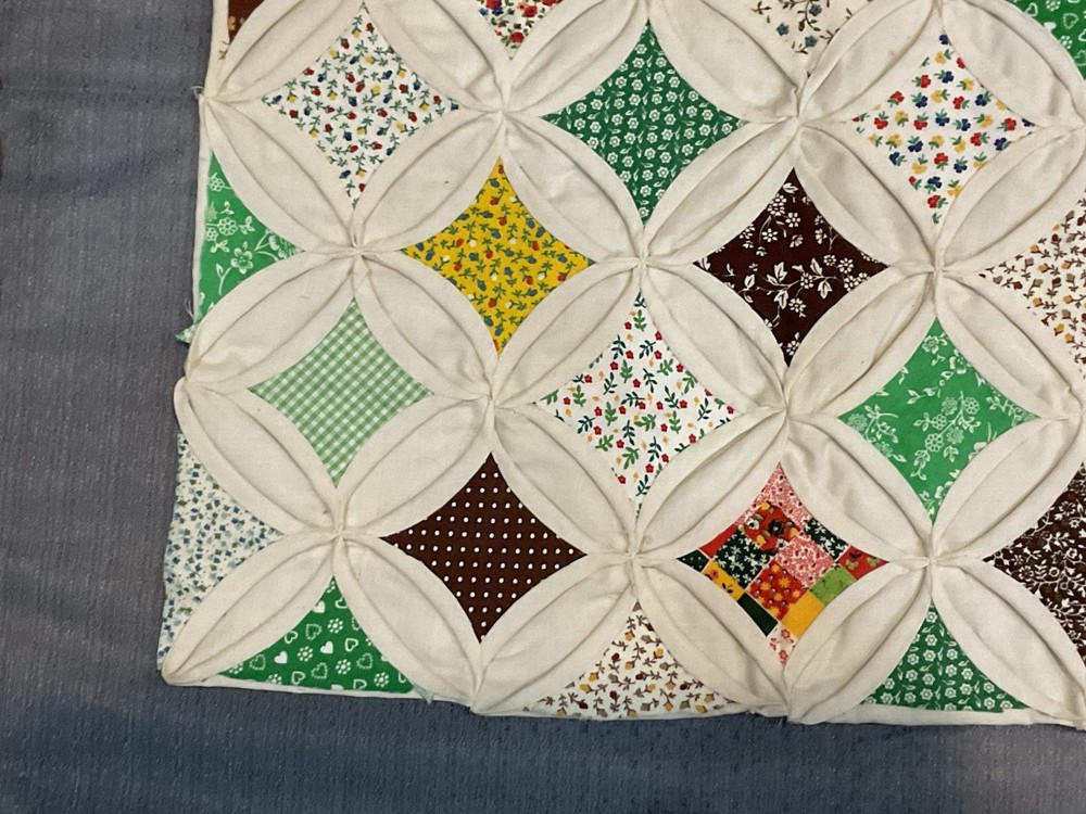Cathedral windows wall quilt