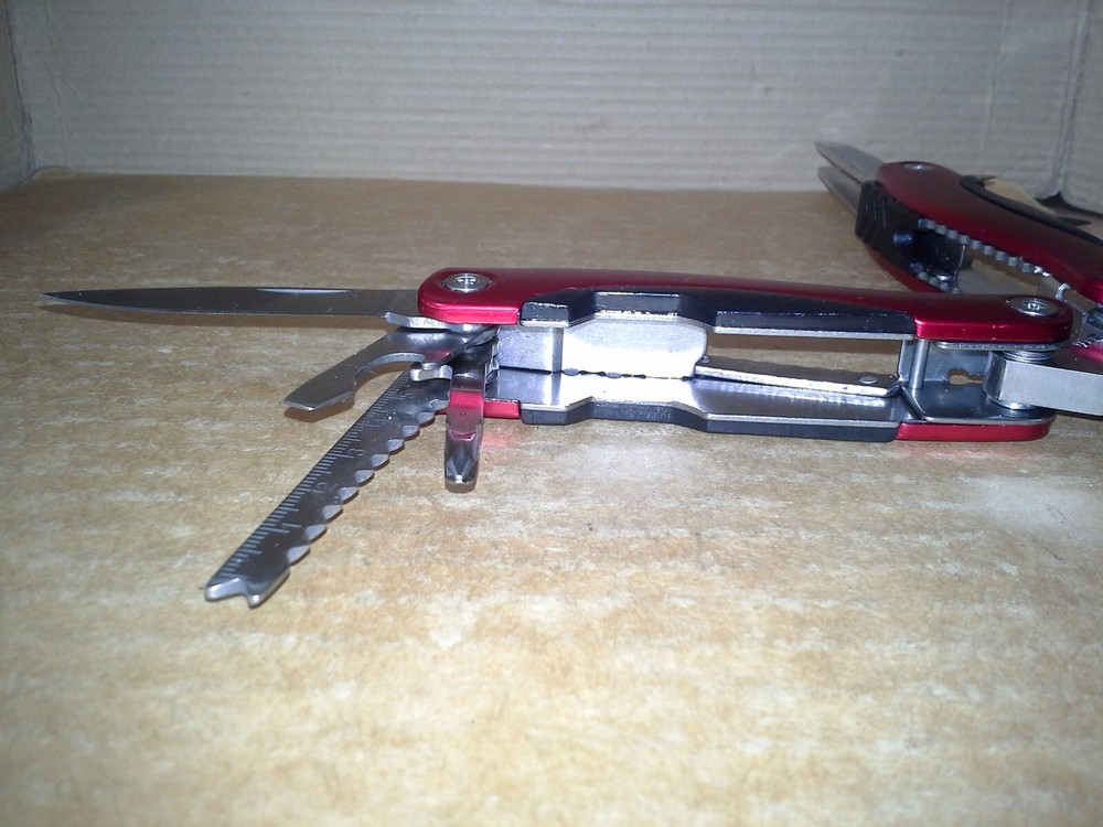 Switzerland Red Multitool Folding Pocket Pliers. VGC