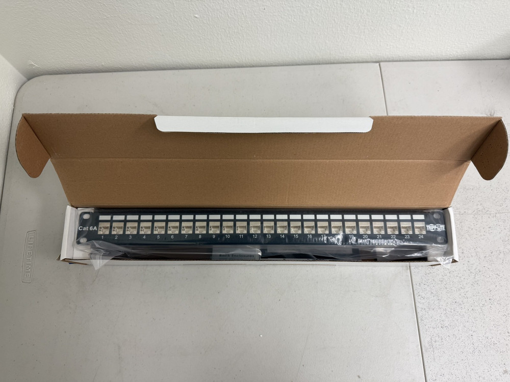TrippLite Shielded Cat6A Rackmount Feed Through Patch Panel Model N254-024-SH-6A