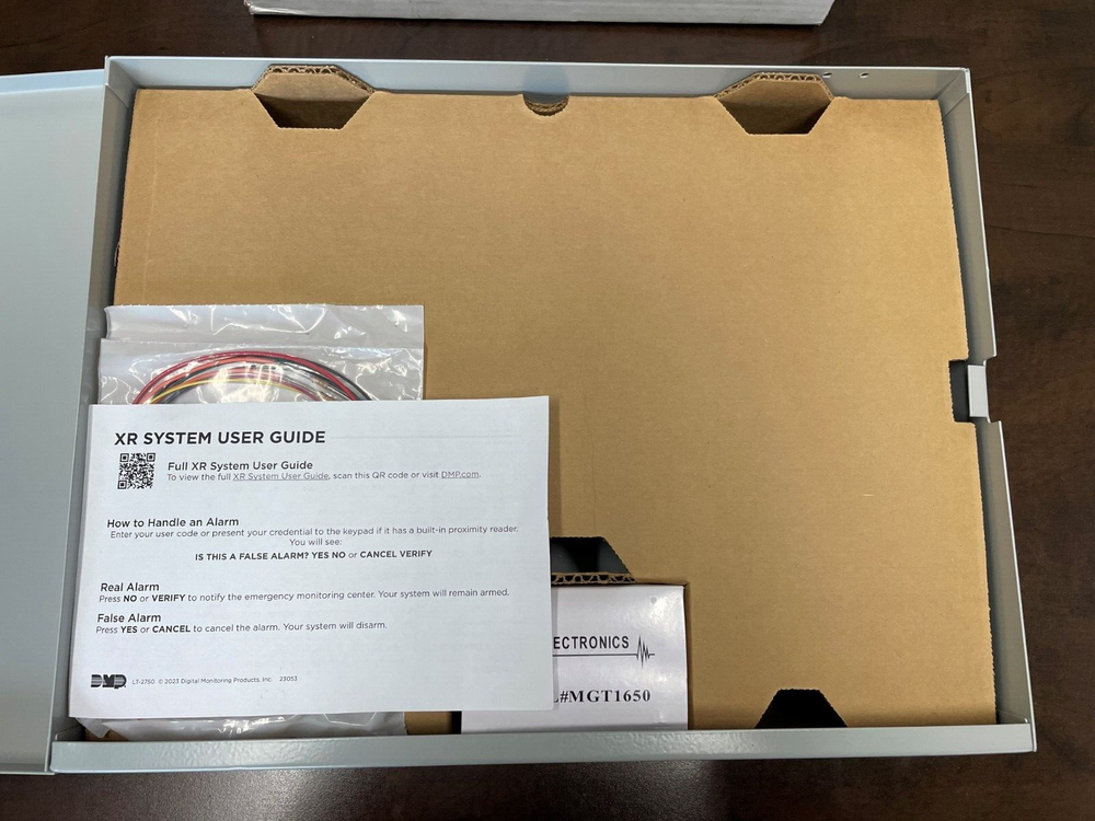 DMP XR150NL-G Network Panel Assembly and Accessories.